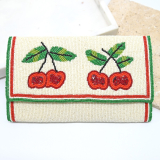 Beaded cream clutch with cherries 
