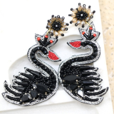 Beaded black swan earrings
