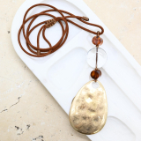 Acrylic resin and alloy pendant necklace